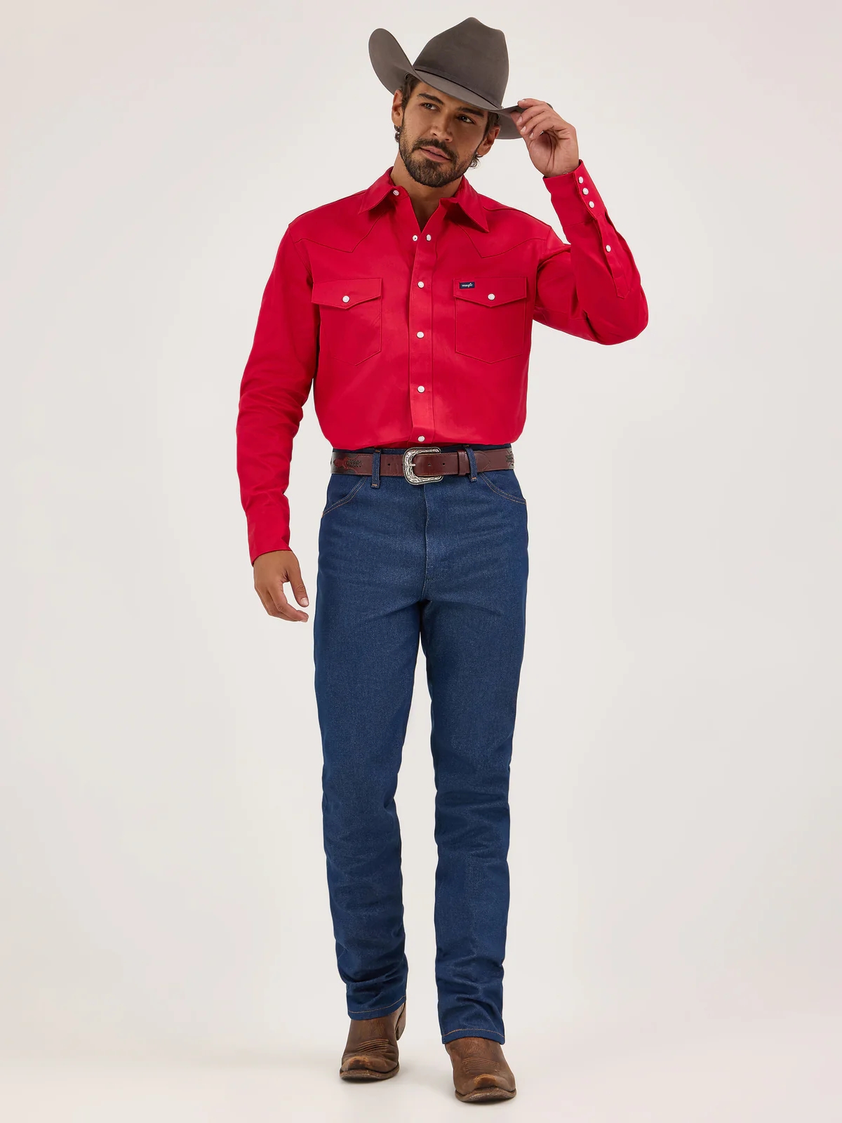 Wrangler red western snap shirt with cowboy hat and jeans